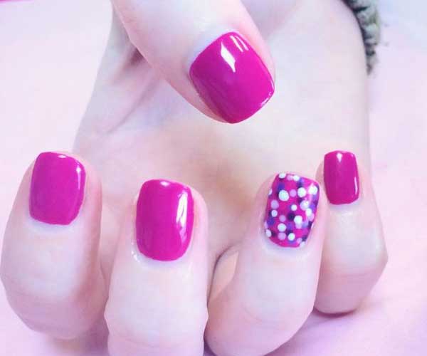 Pink polkadot nails